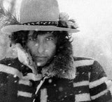 Bob Dylan sitting bacstage during the Rolling Thunder review tour. 1975
