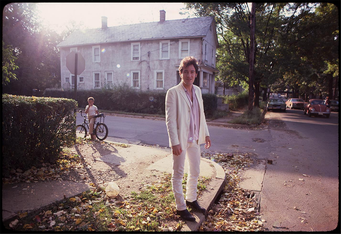 Bruce Springsteen standing outside his childhood home.

Freehold, NJ. 1979