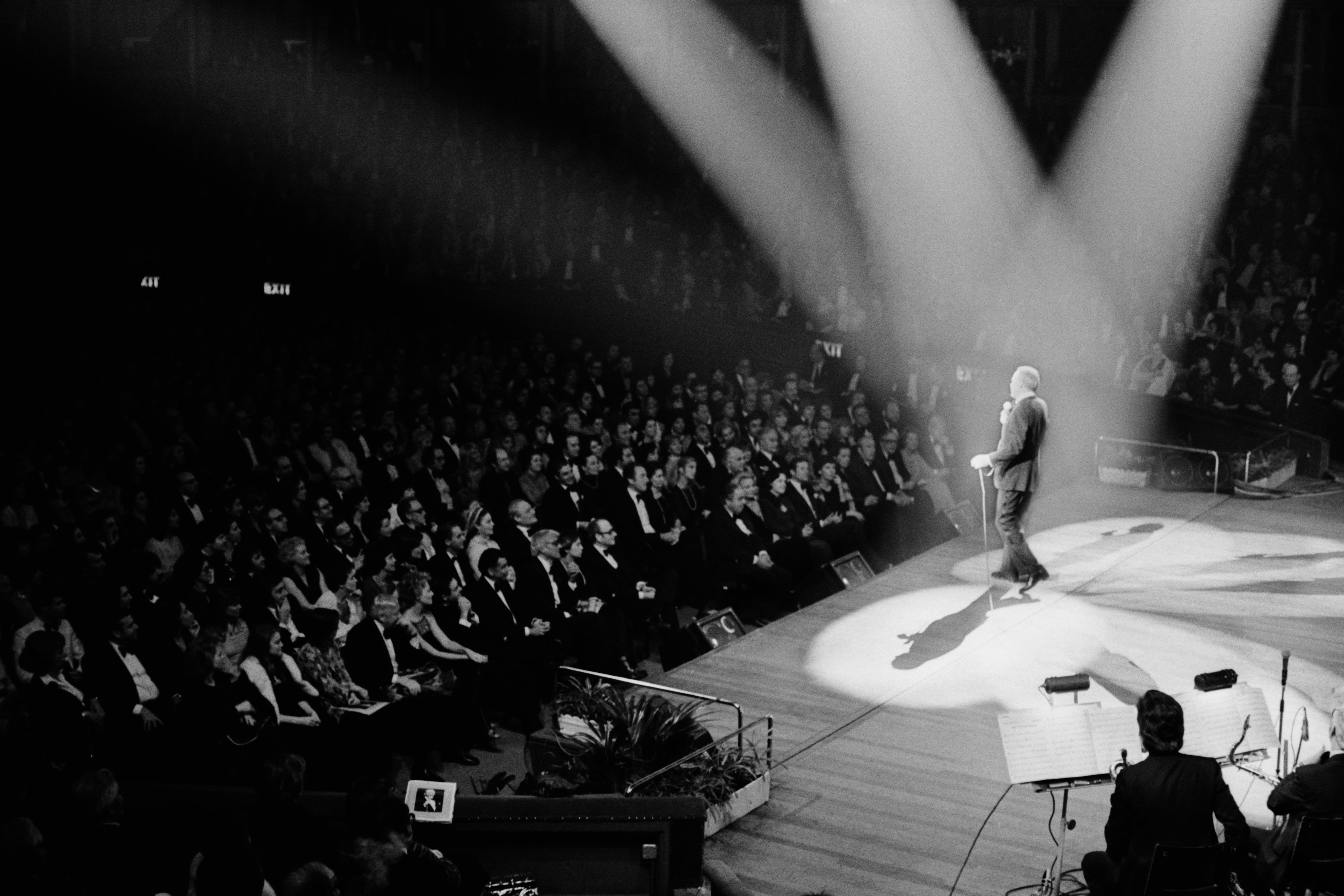 American singer and actor Frank Sinatra (1915 – 1998) in concert at the Royal Albert Hall, 1975.